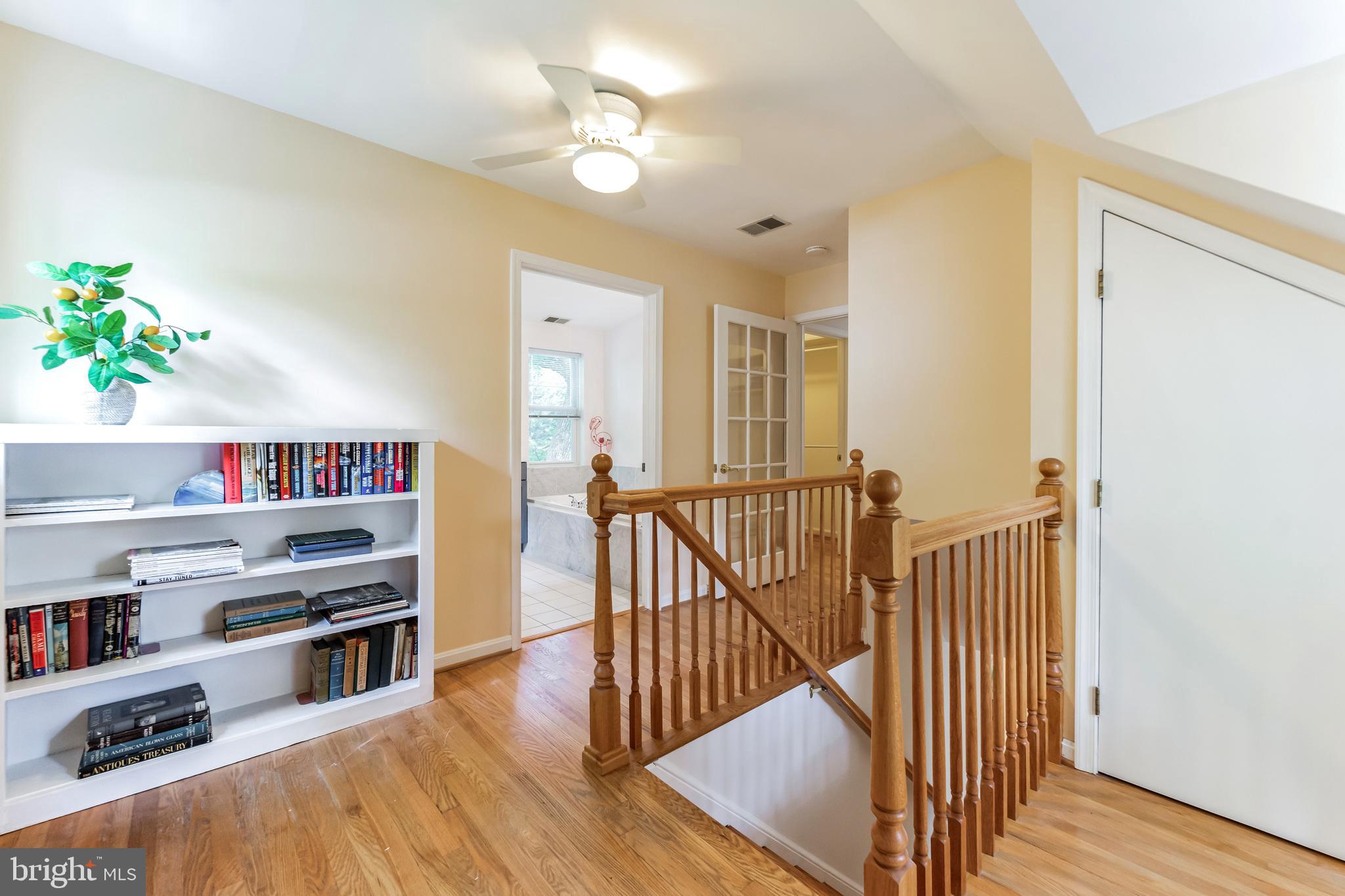 8907 Sudbury Road Silver Spring, MD 20901 - Photo 15 of 29 Upper level landing with built-ins