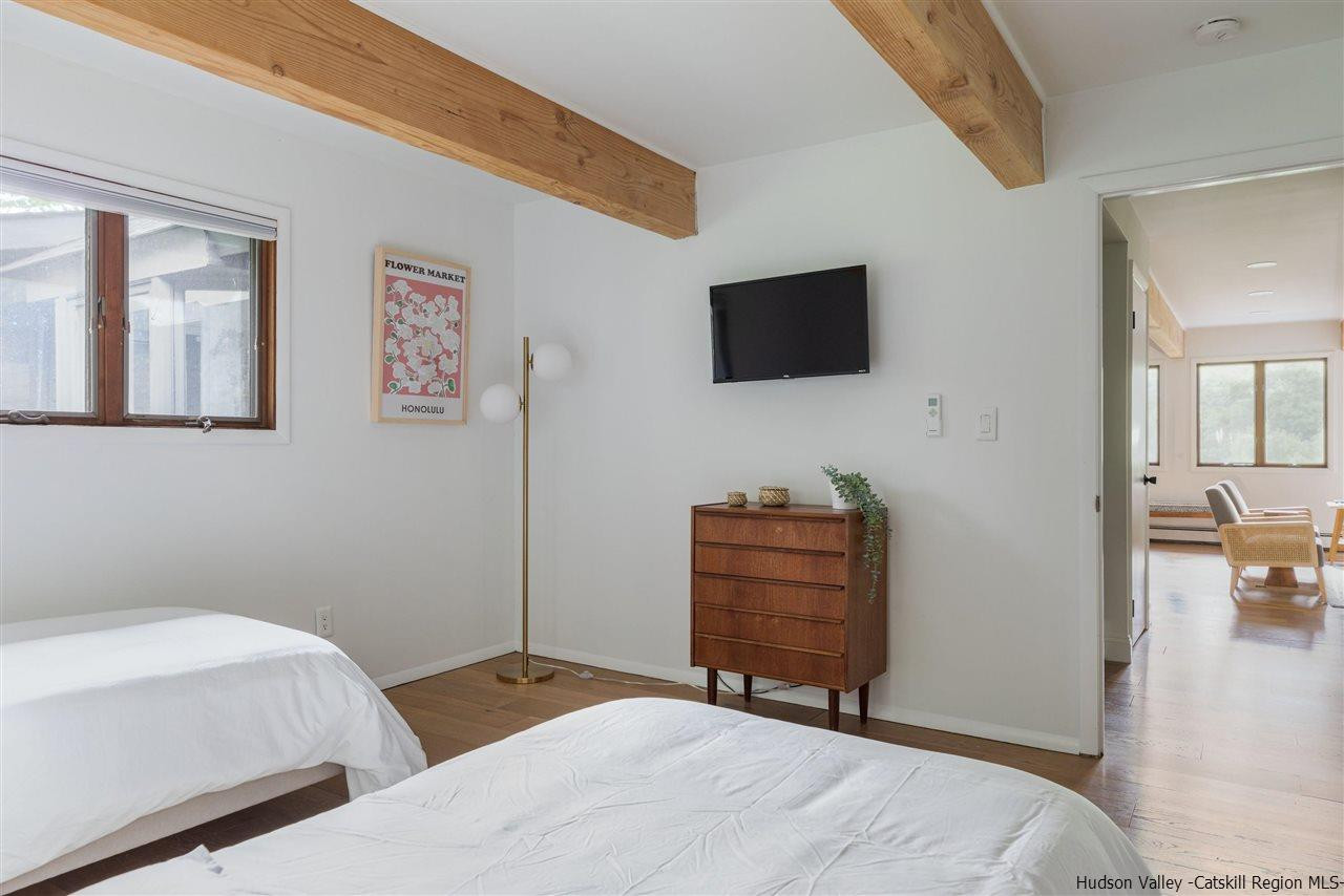 1882 County Road Olivebridge, NY 12461 - Photo 24 of 35 a bedroom with a bed and flat screen tv