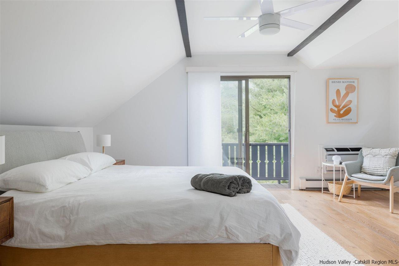 1882 County Road Olivebridge, NY 12461 - Photo 26 of 35 a bedroom with a bed and a large window