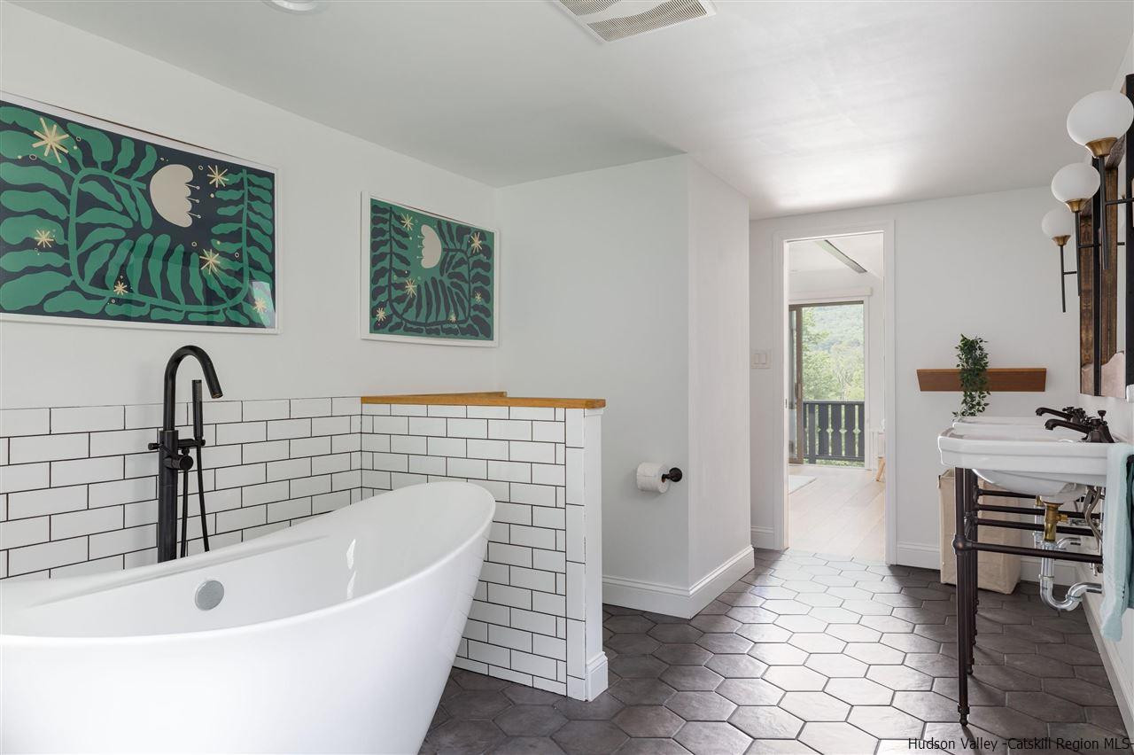 1882 County Road Olivebridge, NY 12461 - Photo 29 of 35 a bathroom with a bathtub and a sink