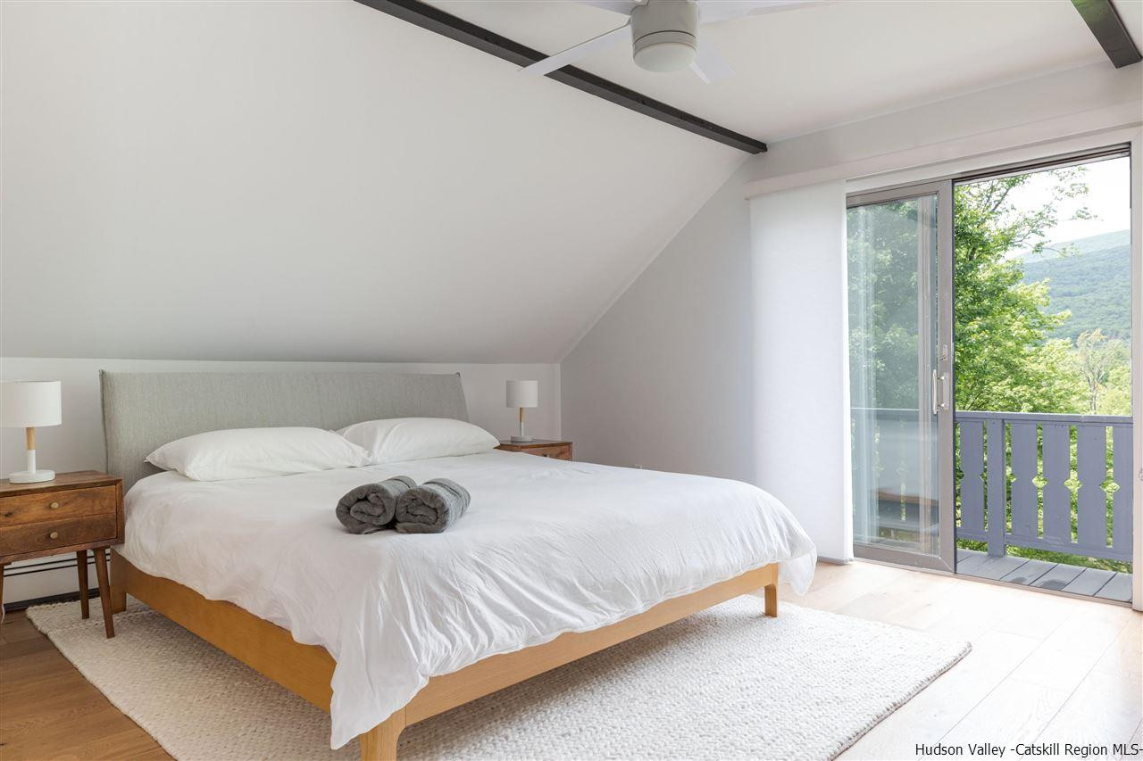 1882 County Road Olivebridge, NY 12461 - Photo 5 of 35 a bedroom with a bed and window