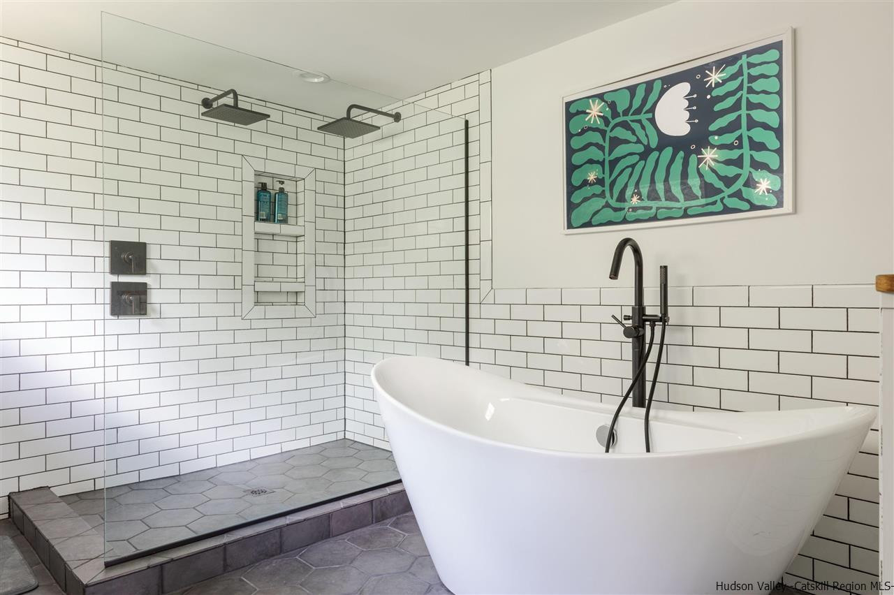 1882 County Road Olivebridge, NY 12461 - Photo 6 of 35 a white bath tub sitting in a bathroom