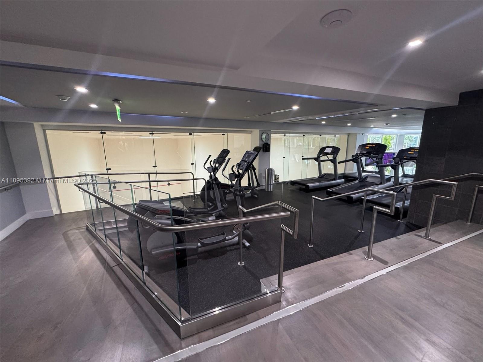 901 Brickell Key Boulevard, Unit 3607 Miami, FL 33131 - Photo 33 of 46 a kitchen with lots of counter top space