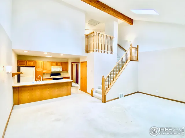 a view of a living room and bathroom