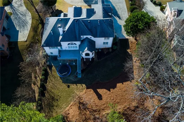 a kitchen with stainless steel appliances granite countertop a stove and a microwave