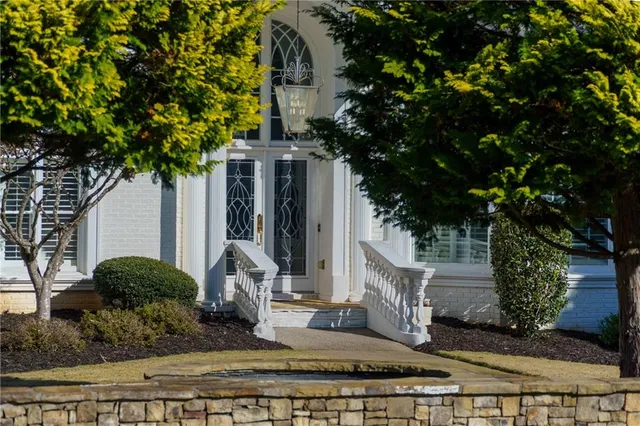 a kitchen with stainless steel appliances a sink stove and refrigerator