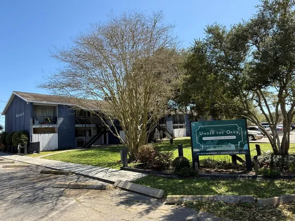 a view of a bench in a backyard
