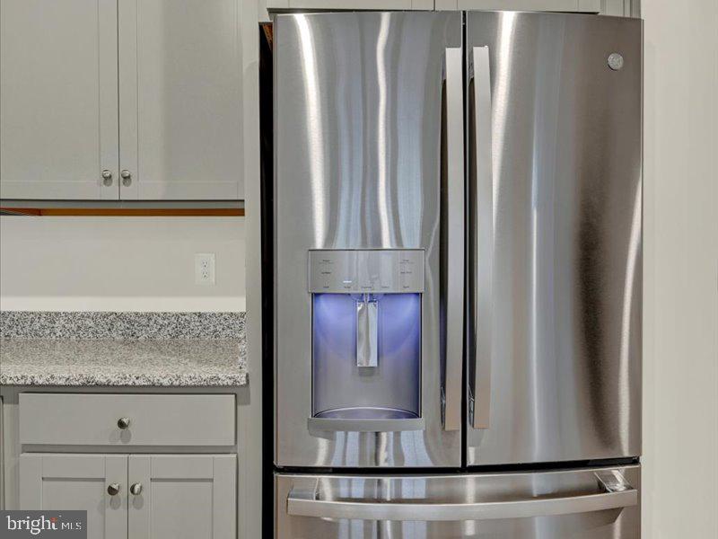 4003 Seaside Alder Road, Unit 102 ASTER Bowie, MD 20720 - Photo 13 of 27 a view of kitchen with white cabinets