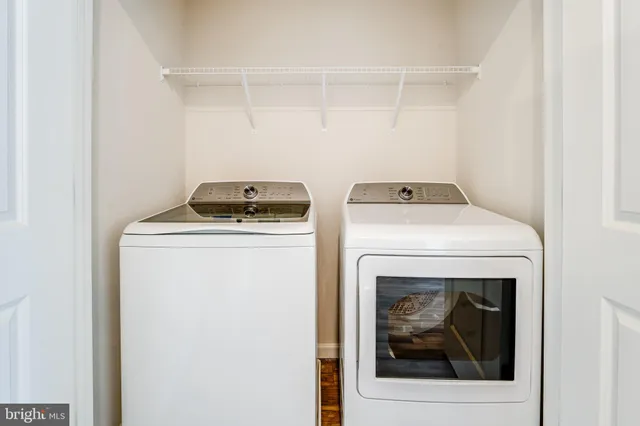 a utility room with dryer and washer