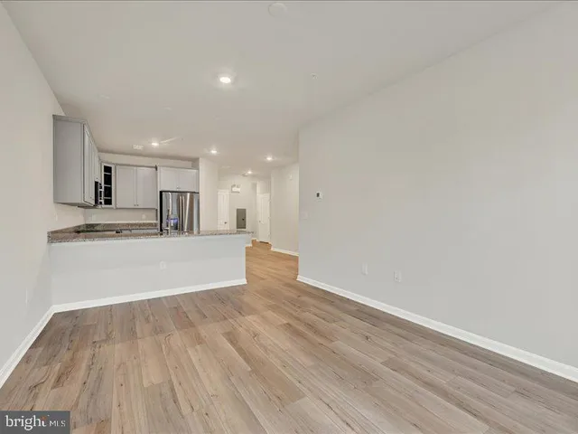 a view of kitchen with wooden floor