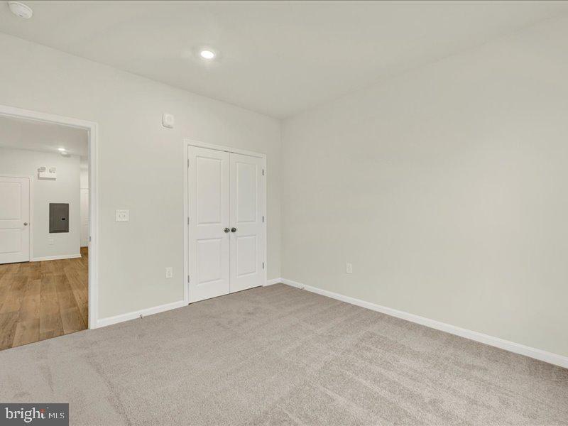 4003 Seaside Alder Road, Unit 102 ASTER Bowie, MD 20720 - Photo 21 of 27 a view of an empty room