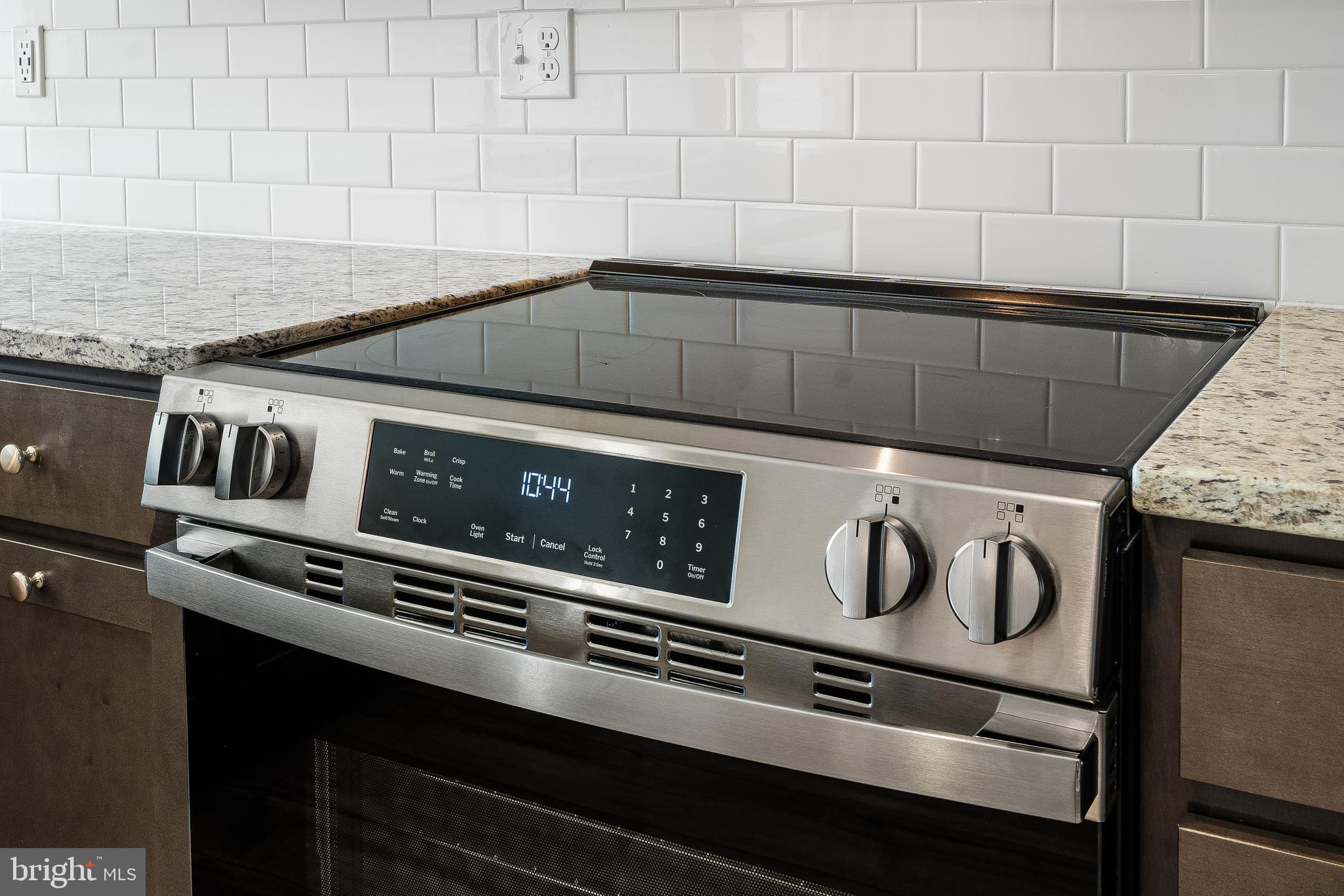 4003 Seaside Alder Road, Unit 102 ASTER Bowie, MD 20720 - Photo 7 of 16 a close view of stove