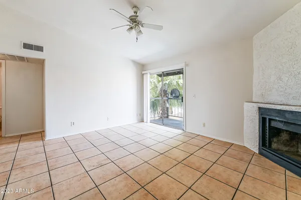 a view of an empty room and window
