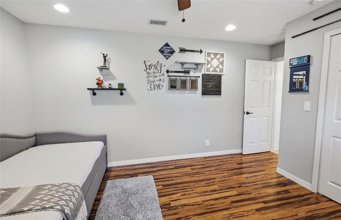 1771 Mistletoe Street Sebastian, FL 32958 - Photo 25 of 36 a bedroom with furniture and window