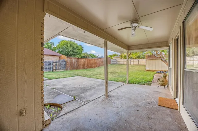 a view of a porch with a backyard