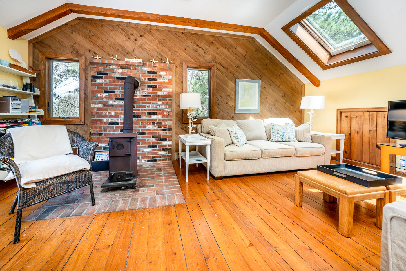 150 Herring Brook Road Eastham, MA 02642 - Photo 18 of 54 a living room with furniture and a wooden floor