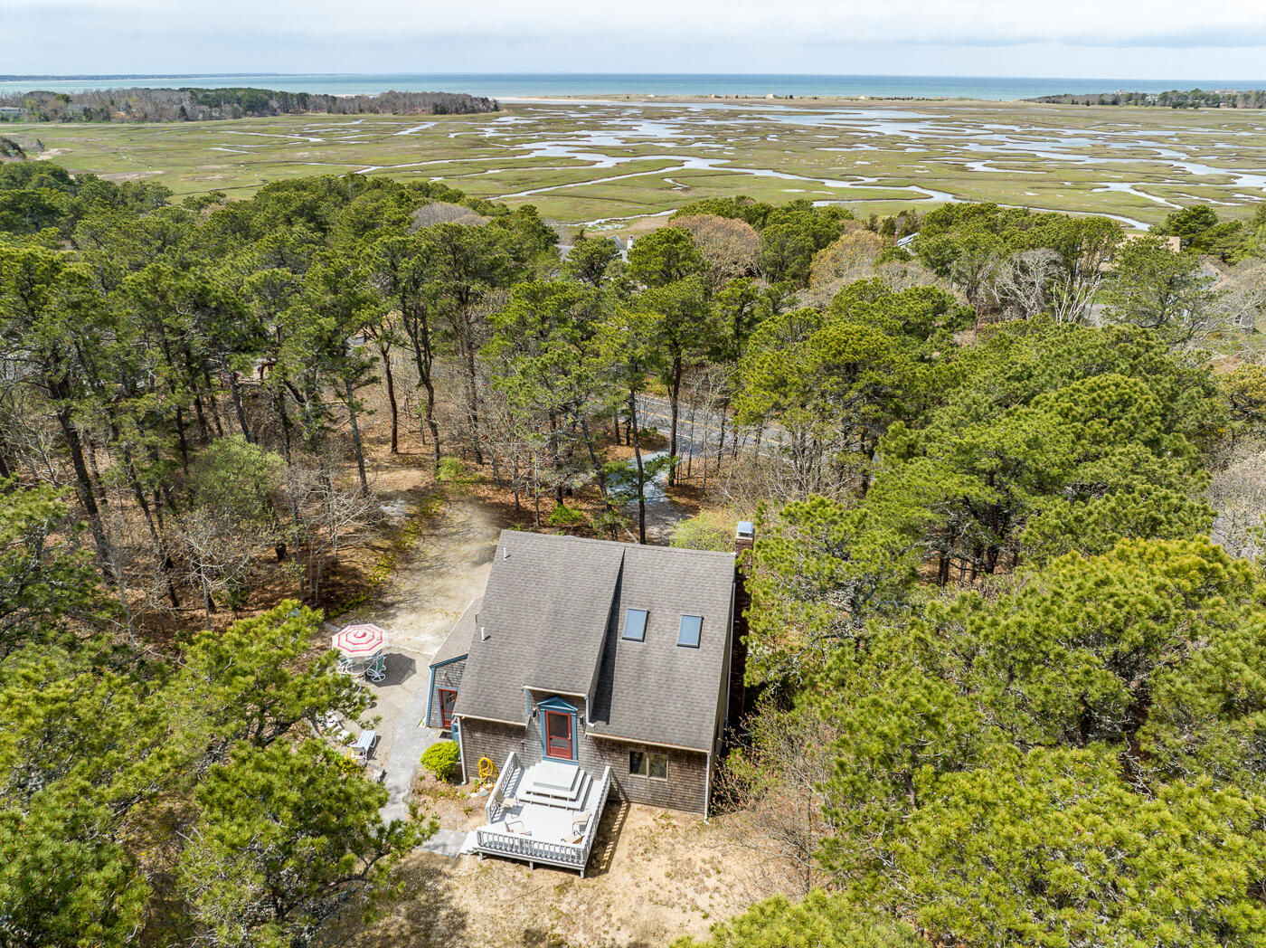 150 Herring Brook Road Eastham, MA 02642 - Photo 2 of 54 a view of an ocean from a building