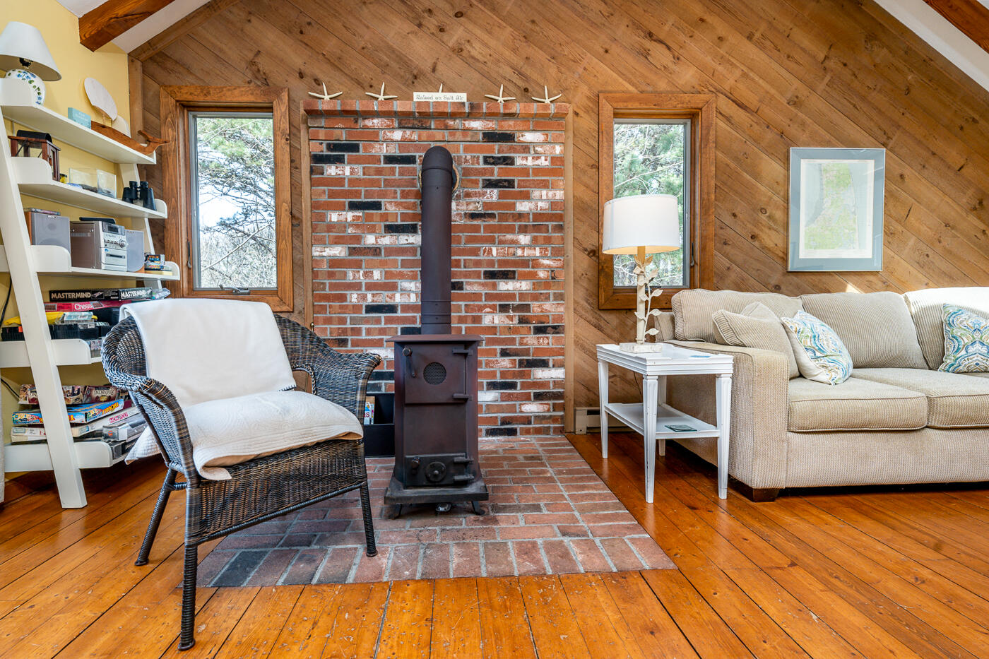 150 Herring Brook Road Eastham, MA 02642 - Photo 21 of 54 a living room with furniture and a wooden floor