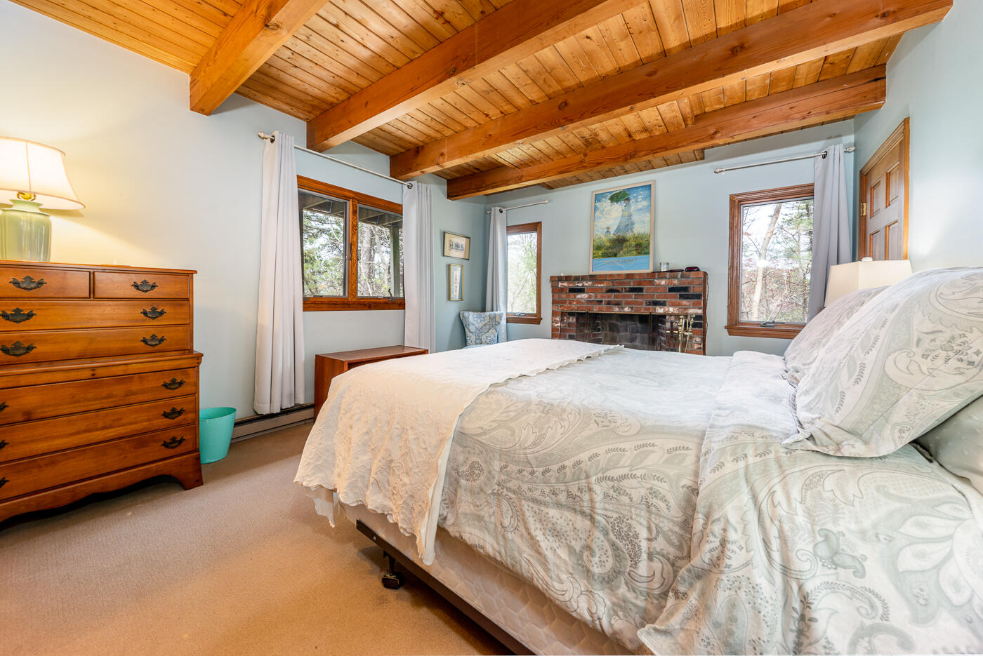 150 Herring Brook Road Eastham, MA 02642 - Photo 30 of 54 a bed sitting in a spacious bedroom next to a window