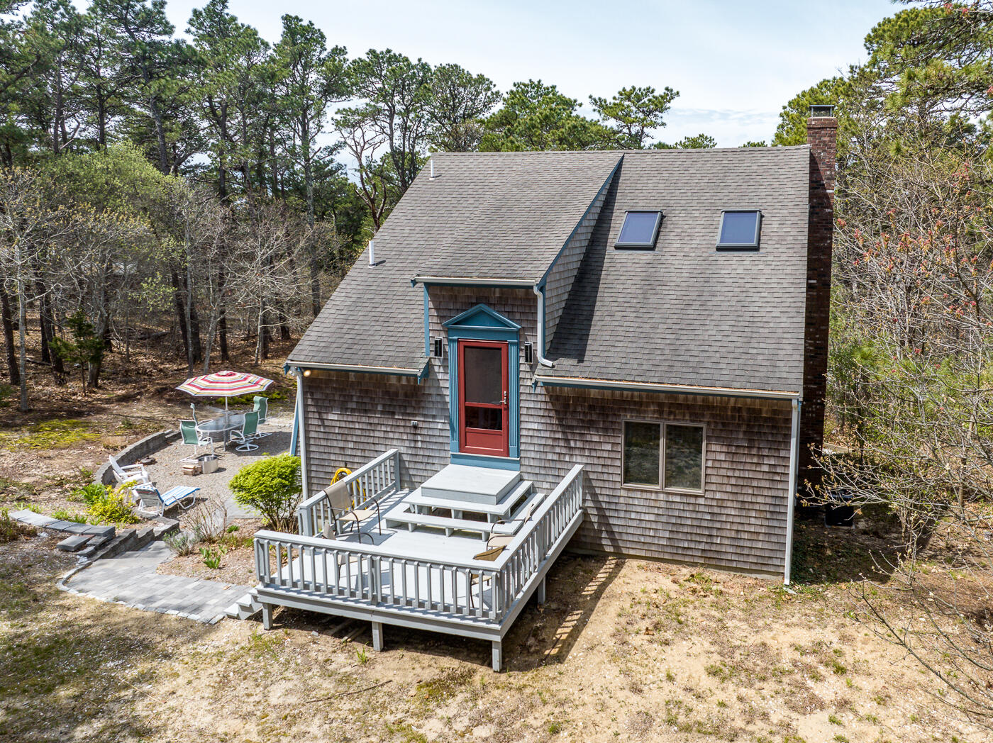 150 Herring Brook Road Eastham, MA 02642 - Photo 4 of 54 front view of a house with a small yard