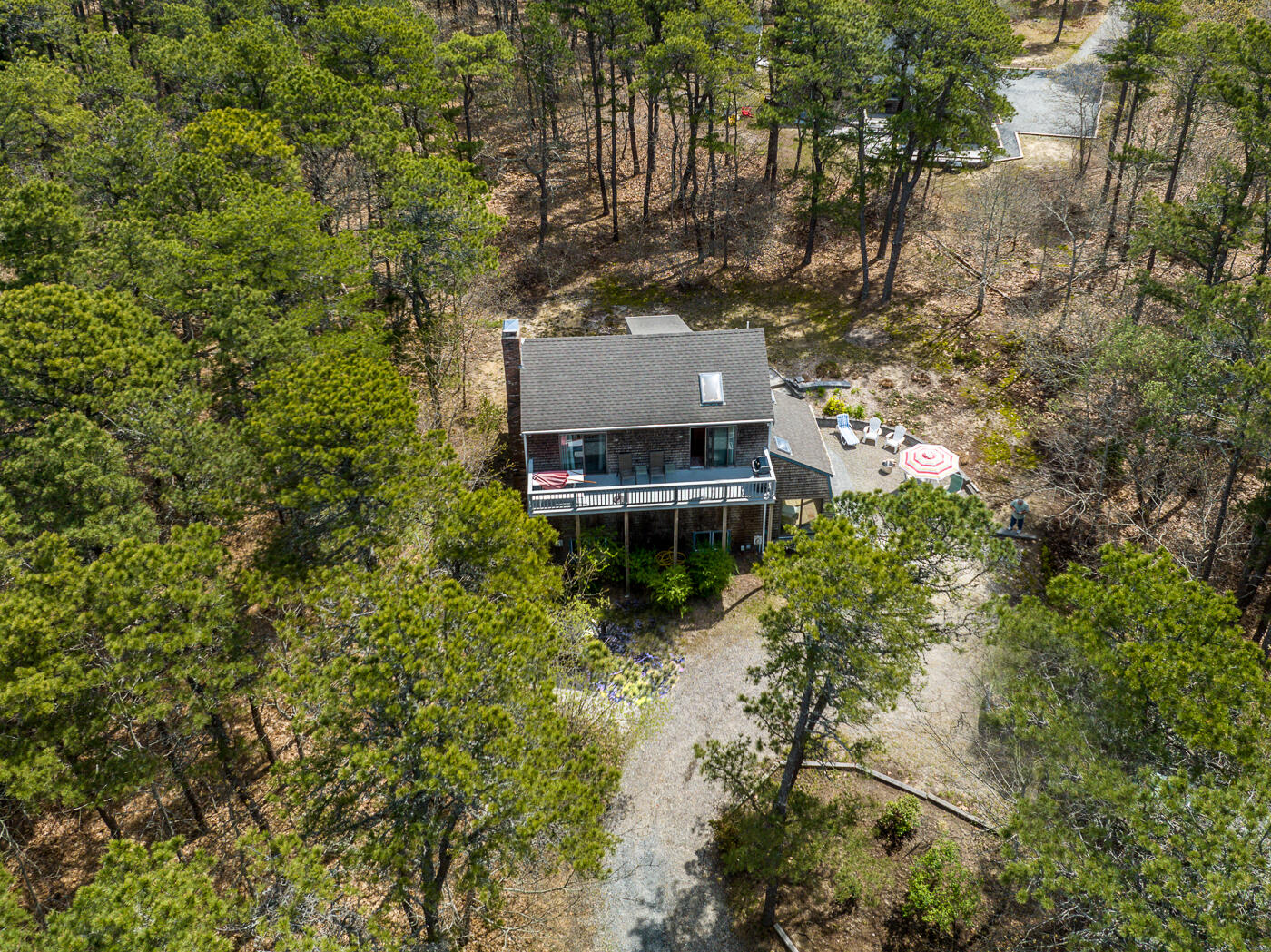 150 Herring Brook Road Eastham, MA 02642 - Photo 45 of 54 a aerial view of a house with a yard