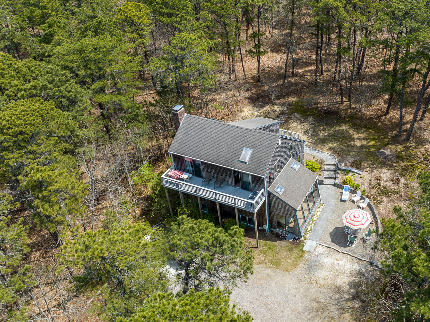 150 Herring Brook Road Eastham, MA 02642 - Photo 6 of 54 an aerial view of a house with a yard