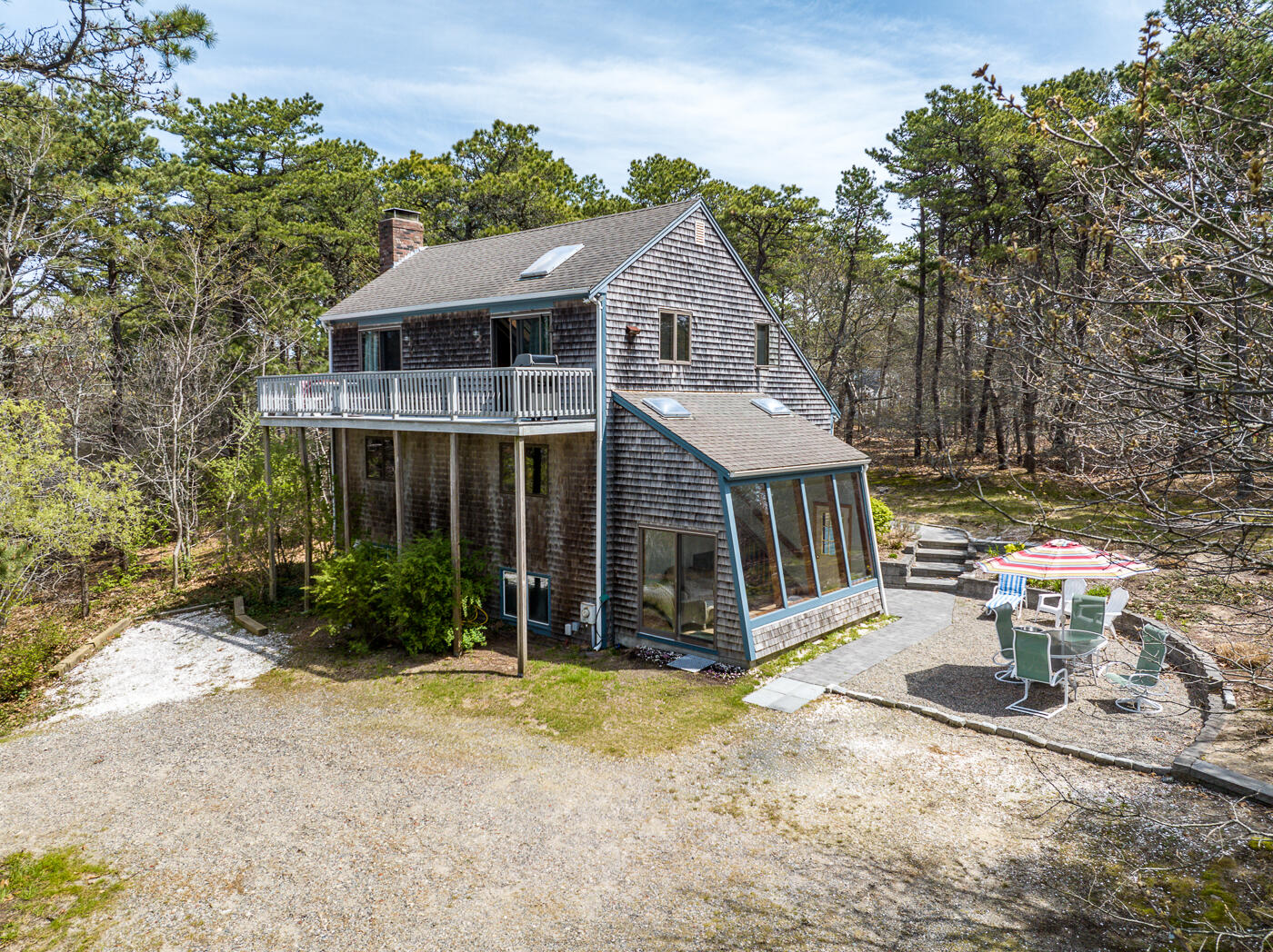 150 Herring Brook Road Eastham, MA 02642 - Photo 7 of 54 front view of a house with a yard