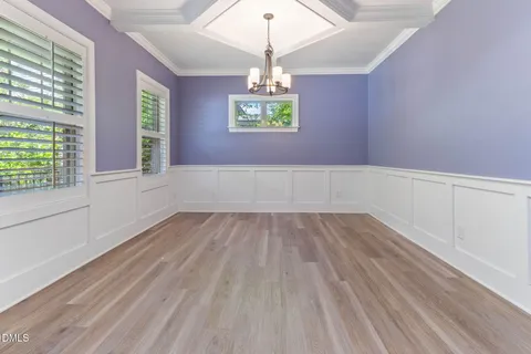 a bathroom with a sink a mirror and shower