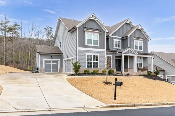 front view of a house with a yard