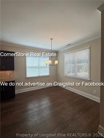 a view of a big room with wooden floor