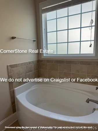 a bathroom with sink and mirror