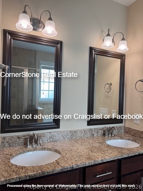 547 Micahs Way North Spring Lake, NC 28390 - Photo 22 of 28 a bathroom with sink and mirror