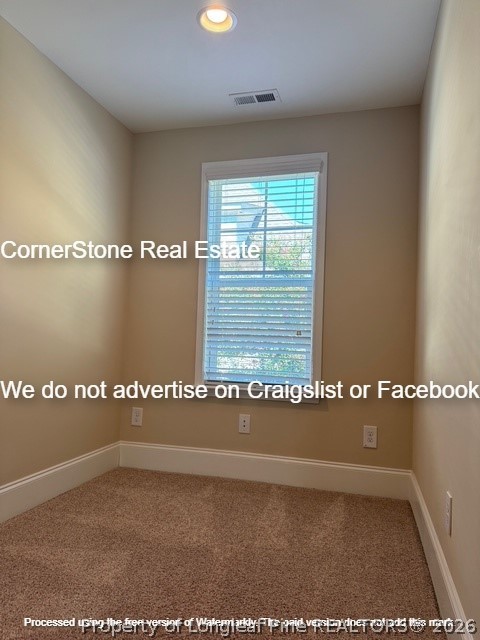 547 Micahs Way North Spring Lake, NC 28390 - Photo 26 of 28 a view of a room with lots of green space