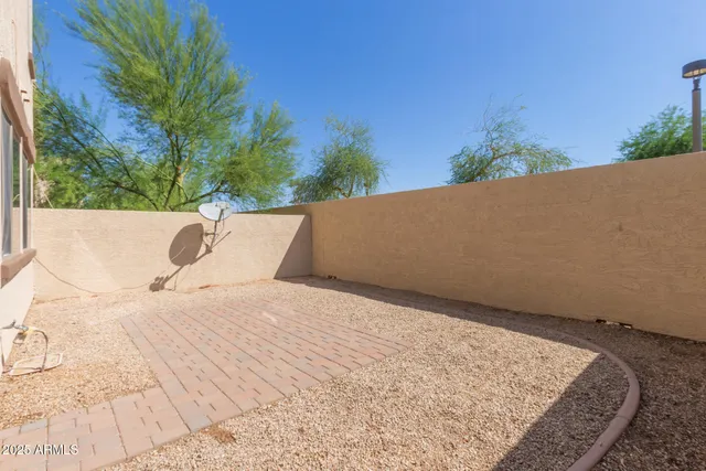 a bathroom with a sink toilet vanity and tub