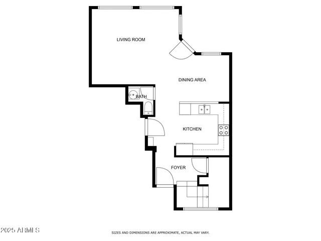 a view of a field with houses in background