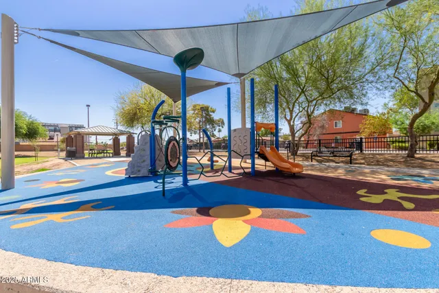 a view of a swimming pool with outdoor seating