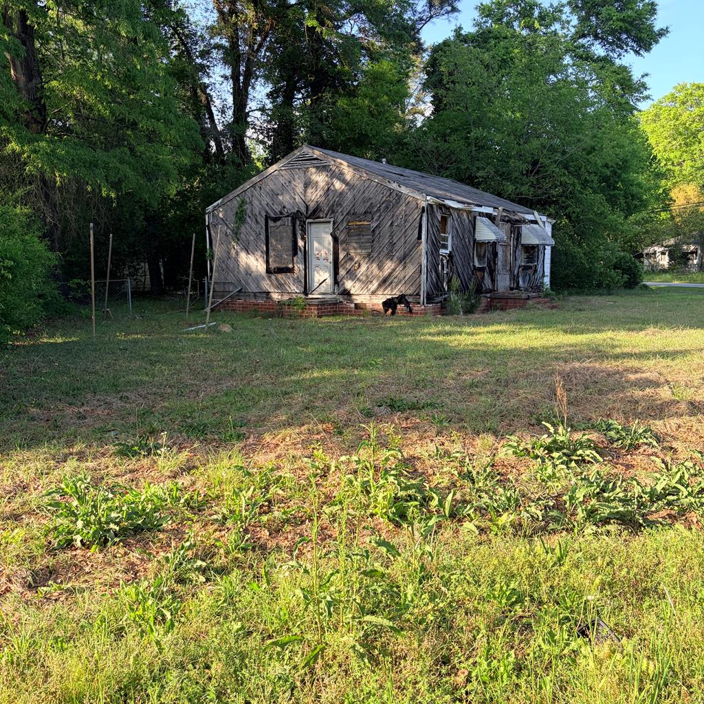 3135 Baker Circle Columbus, GA 31903 - Photo 2 of 7 a house view with swimming pool in front of it