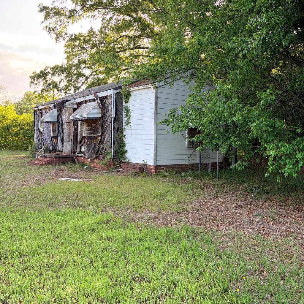 3135 Baker Circle Columbus, GA 31903 - Photo 5 of 7 a view of a house with a yard