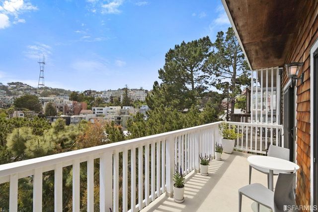 a view of a city from a balcony