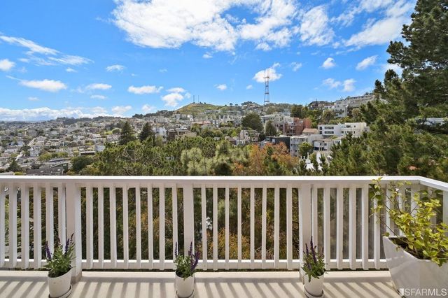 a view of a wooden fence