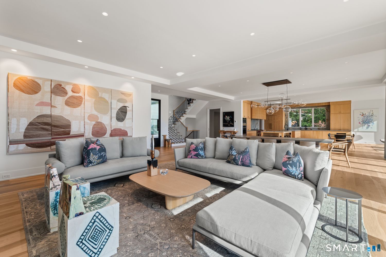 19 Beachside Common Westport, CT 06880 - Photo 14 of 40 a living room with furniture and a lamp