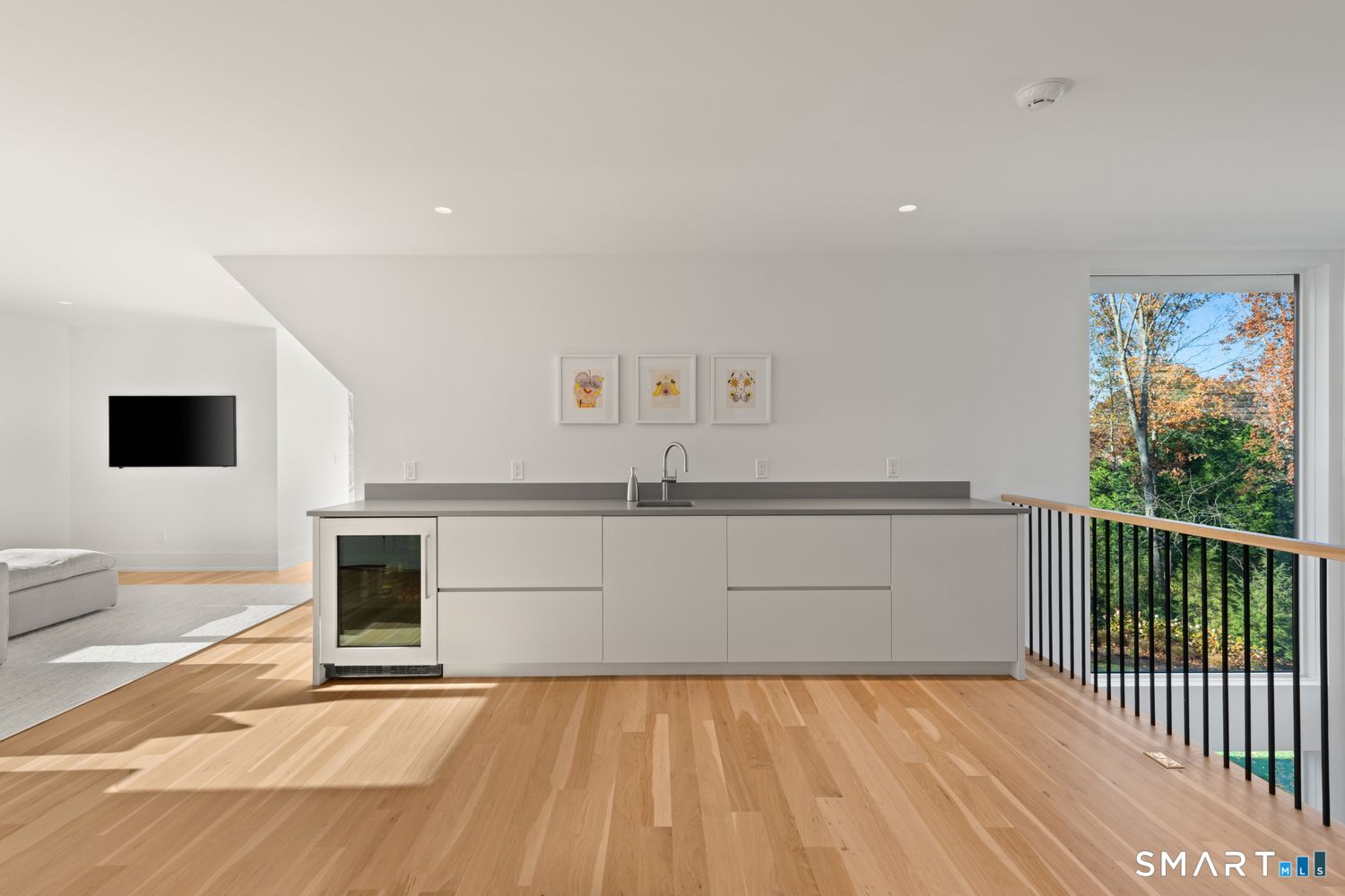 19 Beachside Common Westport, CT 06880 - Photo 29 of 40 a view of a living room with a flat screen tv