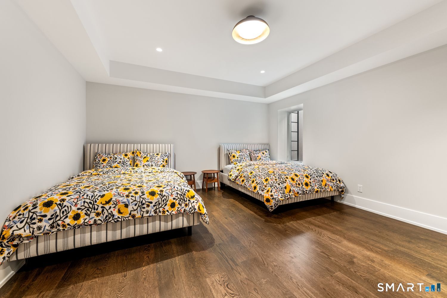 19 Beachside Common Westport, CT 06880 - Photo 32 of 40 a bedroom with a bed and a night stand