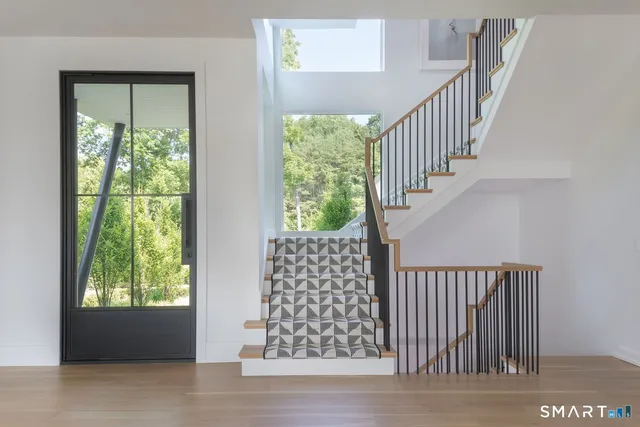a view of entryway with stairs