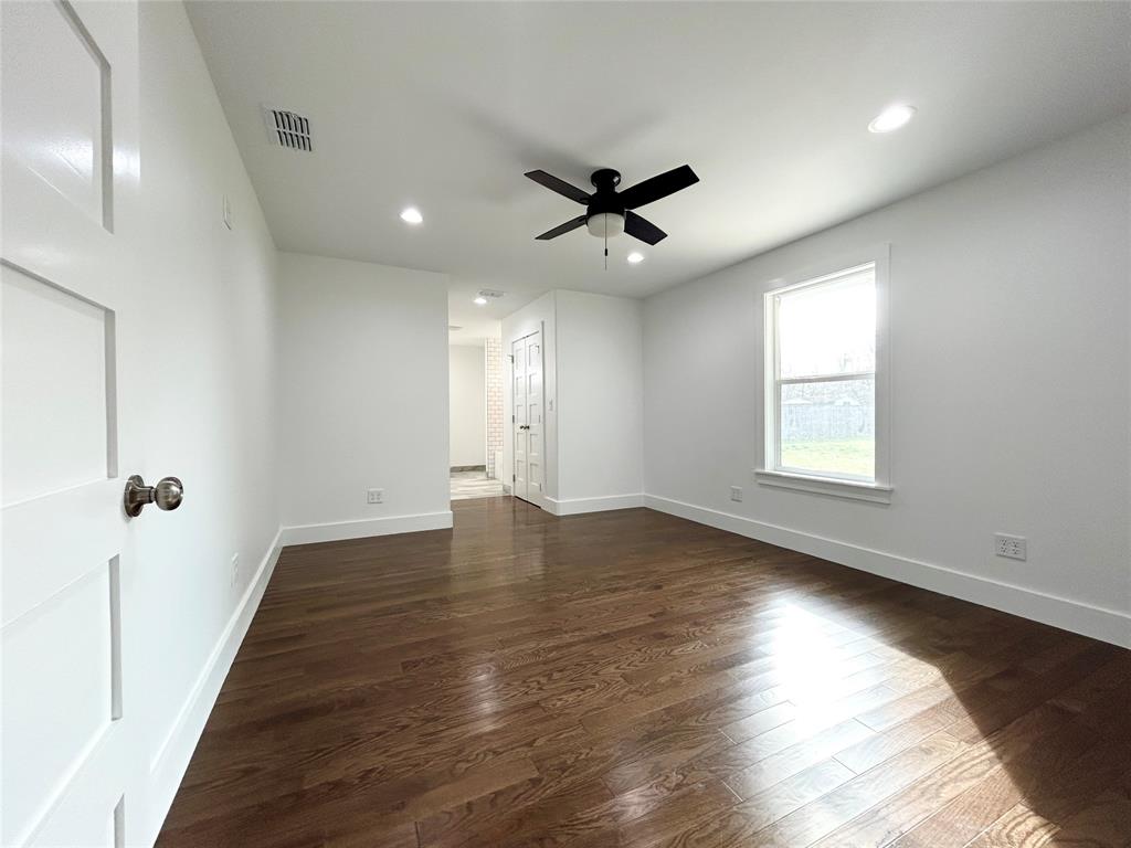 102 Colorado Street Sulphur Springs, TX 75482 - Photo 11 of 25 Primary bedroom with a private en-suite bathroom