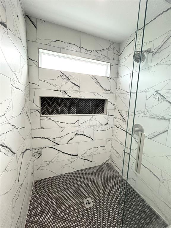 102 Colorado Street Sulphur Springs, TX 75482 - Photo 17 of 25 Luxurious and spacious walk in shower