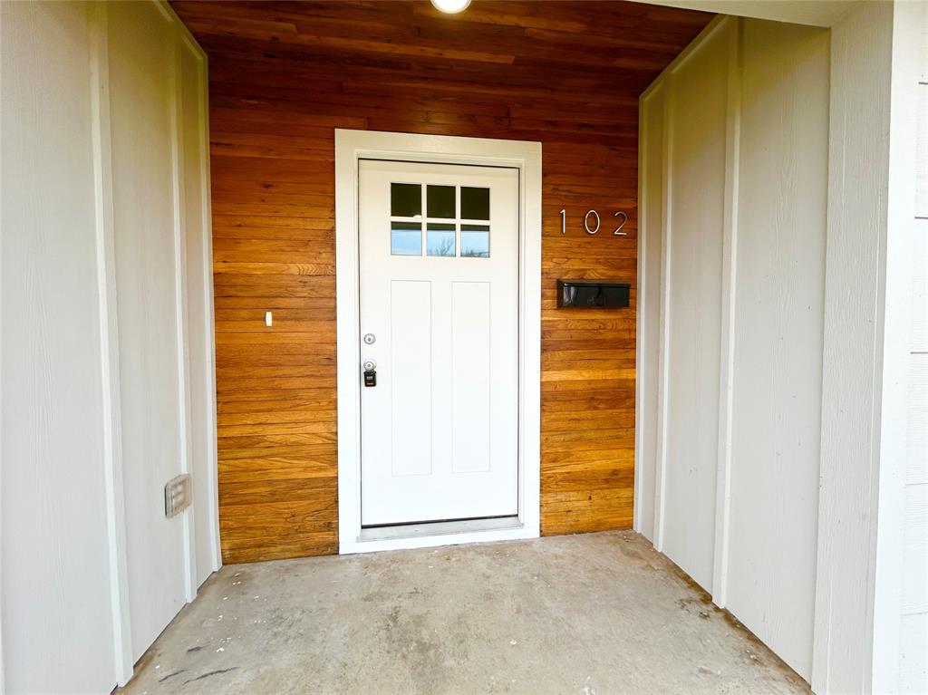 102 Colorado Street Sulphur Springs, TX 75482 - Photo 2 of 25 Entryway made from original hardwoods preserve the warmth and character of this newly remodeled home.