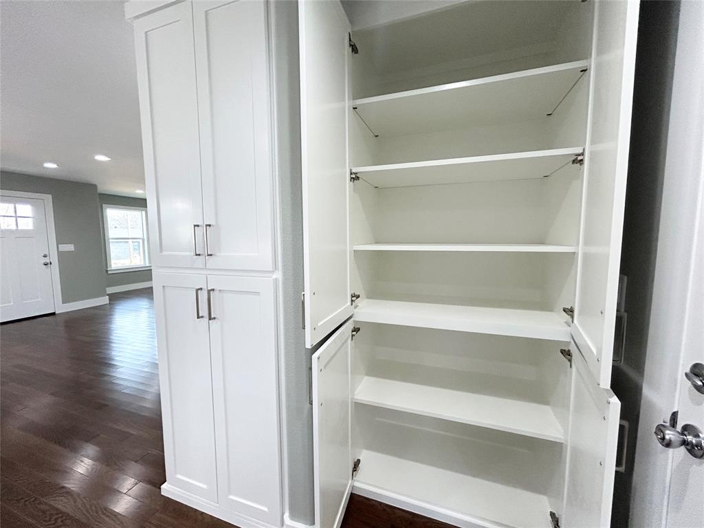 102 Colorado Street Sulphur Springs, TX 75482 - Photo 9 of 25 Custom cabinetry throughout offering plenty of storage!