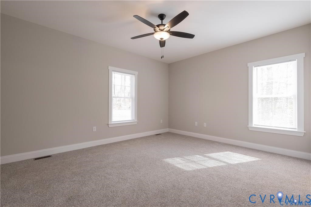 2223 Ridge Road Arvonia, VA 23004 - Photo 19 of 32 Spacious room featuring neutral carpeting, light-t