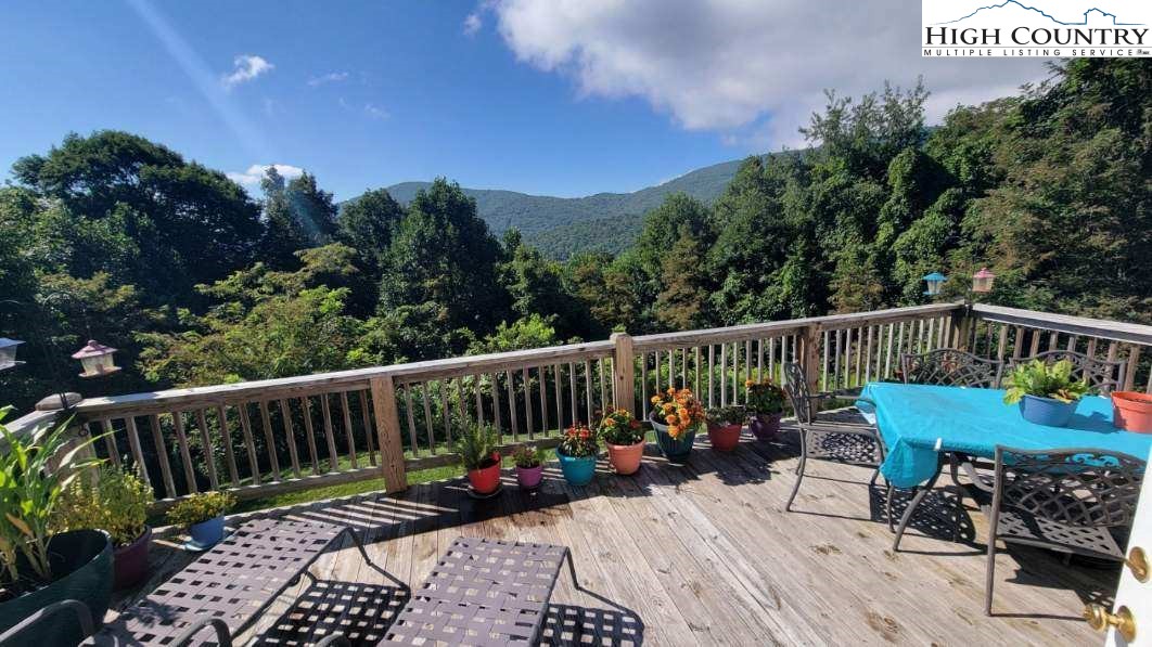 412 Mulberry Mountain Road Boone, NC 28607 - Photo 2 of 31 a view of balcony with furniture